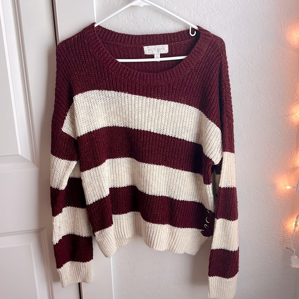 A striped burgundy and cream sweater, perfect for winter!